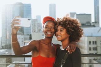 buildings-cellphone-cheerful-1586486 buildings-cellphone-cheerful-1586486
